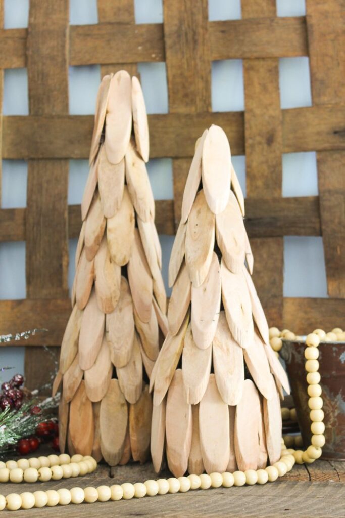 15 DIY Minimalist Christmas Decor on a Budget Ideas 6 wooden christmas tree with wood slices 4 The Old Summers Home This holiday season, bring hygge into your home with a look that is calm, inviting and understated, and do it without spending a ton of money. From the fresh