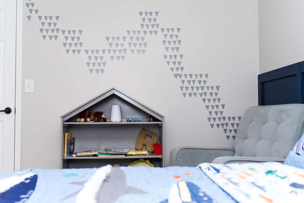 shark tooth stencil on feature wall in child bedroom